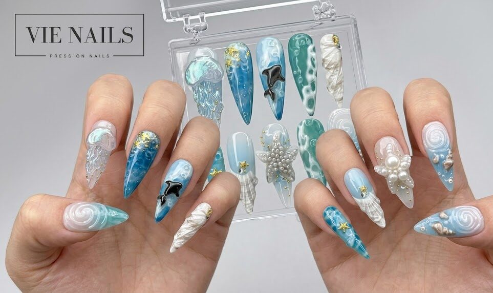 ocean turquoise 3D nails with pearl clusters perfect for NYC summer rooftops
